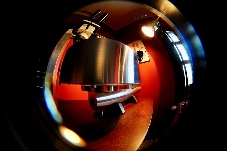 Massive adjustable platter with removable spindle tooling